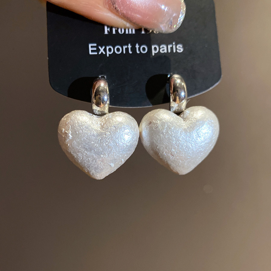 Pendientes coreanos con colgante de corazón 2026, súper bonitos, aretes de moda para mujer, accesorios elegantes y a la moda.